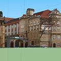 Historic Building Exterior With Red Roof Arched Doors Windows And Tower