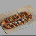 Delicious Pizza Slices with Various Toppings on a Wooden Cutting Board