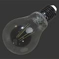 Transparent Light Bulb With Visible Filament And Textured Surface On Gray Background