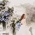 Wedding Photo Check in Spot With White Backdrop Floral Decor Gray Gauze And Step Seats