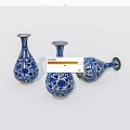 Three Blue and White Ceramic Vases With Traditional Ornate Floral Patterns