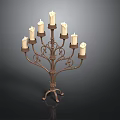 Vintage Metal Candelabra Featuring Intricate Scrollwork And Multiple Lit Candles