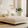 Modern Double Bed with White Leather Headboard Striped Bed Linen Bedside Lamp and Window Plant