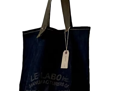 Stylish Dark Blue Canvas Tote Bag Pendant with Leather Handles and Manufacturer Text Label 3d model
