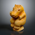 Yellow Hippo Sculpture Carved in Sitting Pose with Detailed Artistic Design and Smooth Texture