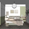 Cozy Bedroom Interior With Green Paneled Walls Round Pendant Light Artwork Pillows And Throw Blanket