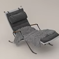 Comfortable Gray Lounge Chair With Padded Seat Wooden Armrests And Fluffy Blanket