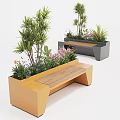 Modern Outdoor Bench With Wooden Seat And Planter Box Filled With Green Plants