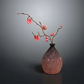 Carved Vase Sculpture With Textured Brown Surface And Pink Flower Branches On Dark Background