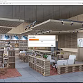 Specialty Store Interior Design With Wooden Shelves Product Displays Ceiling Lighting And Seating Area