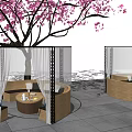 Outdoor Public Seating Area With Circular Wooden Seats Under Cherry Blossom Tree And Transparent Curtains