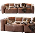 Brown Leather Two Seater Sofa With Patterned Pillows And Cozy Throws 3d model