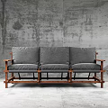 Gray Three Seat Leisure Chair With Wooden Frame And Gray Rough Wall Background