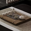 Traditional Tea Tray Setup With Teapot Teacups And Buddha Statue On Mat 3d model