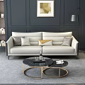 Modern Beige Sofa and Black Round Coffee Table Set with Decorative Pillows and Artwork 3d model