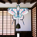 Traditional Japanese Butterfly Wind Chime Pendant With Colorful Floral Patterns Hanging In Wooden Interior