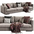 Cozy Gray Three Seater Sofa With Patterned Throw Pillows And Knitted Blanket 3d model