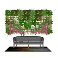 Lush Indoor Living Plant Wall With Green Foliage And Pink Flowers Above Sofa