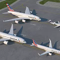 American Airlines Passenger Planes Including A321 A320 and CRJ900 Parked on Airport Tarmac