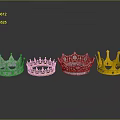 Four Silver And Gold Crowns With Ornate Designs As Decorative Household Items