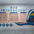 School Storage Area With Colorful Boxes Shelves And Inspirational Wall Decorations