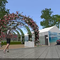 Building Exterior Wall With White Tent Car Advertisement Rose Arch Trees And Pedestrian