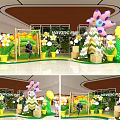 Shopping Mall Interior With Large Colorful Flowers Green Plant Decorations And NAYZEER COM Sign
