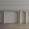 Three Beige Door Arches Against White Wall With Wooden Floor Interior