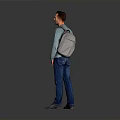 Man Wearing Blue Sweater And Jeans Carrying Backpack Standing Against Gray Background