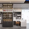Modern Exhibition Hall Interior Featuring Displayed Appliances Sofa Glass Doors And Gray Flooring