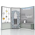 Modern Exhibition Booth Design With Curved Glass Panels And Product Displays