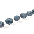 Fresh Juicy Blueberries Arranged In A Curved Line On White Background With Vibrant Purple Color