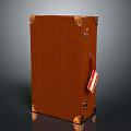 Brown Leather Suitcase With Metal Hardware And Red Luggage Tag