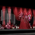 Elegant Wedding Decor With Red Curtains Flower Arrangements And Candles
