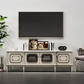 Elegant TV Stand With Wall Mounted TV Decorative Frames Books And Green Plant Accent Chair