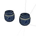 Two blue and white ceramic jars with floral pattern and lids 3d model