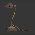 Elegant Copper Table Lamp With Dark Shade And Gold Base Stand