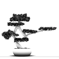 Artistic Bonsai Tree with Curved Branches and Green Foliage in Ceramic Pot