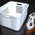White Perforated Laundry Basket And Brown Steam Iron For Daily Household Use