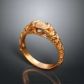Elegant Golden Ring With Intricate Carved Design And Central Gemstone