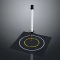 White Columnar Kitchen Appliance With Black Base And Yellow White Circular Rings