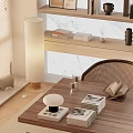 Cozy Restaurant Corner With Wooden Table Wicker Chair Books And White Floor Lamp