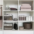 Brown and Transparent Storage Baskets for Closet Organization with Organized Towels and Clothes
