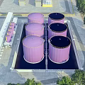 Aerial View Planning of Industrial Facility With Purple Storage Tanks And Black Tops