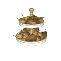 Ripe Fresh Pears Arranged on Two Tiered White Fruit Stand with Golden Base