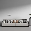 Designer Sectional Sofa With Decorative Pillows Side Table Potted Plant And Gray Wall 3d model