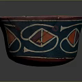 Vintage Red and Blue Decorative Bowl With Geometric Patterns And Cracked Surface