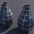 Two Elegant Blue Teardrop Shaped Vases With Gold Cross Line Patterns