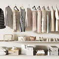 Hanging Clothes With Handbags Shoes And Storage Baskets On Closet Shelves