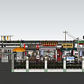 Commercial Street With Outdoor Dining Tables Umbrella Store Signs Green Plants And Fence